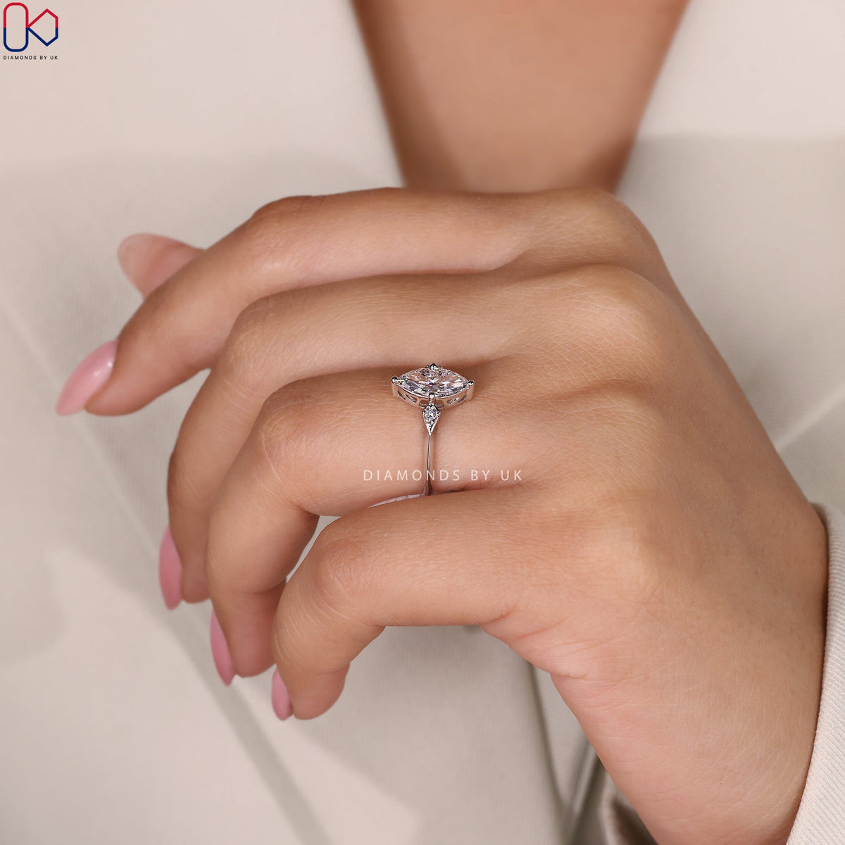 Marquise and Round Diamond engagement Ring In White Gold