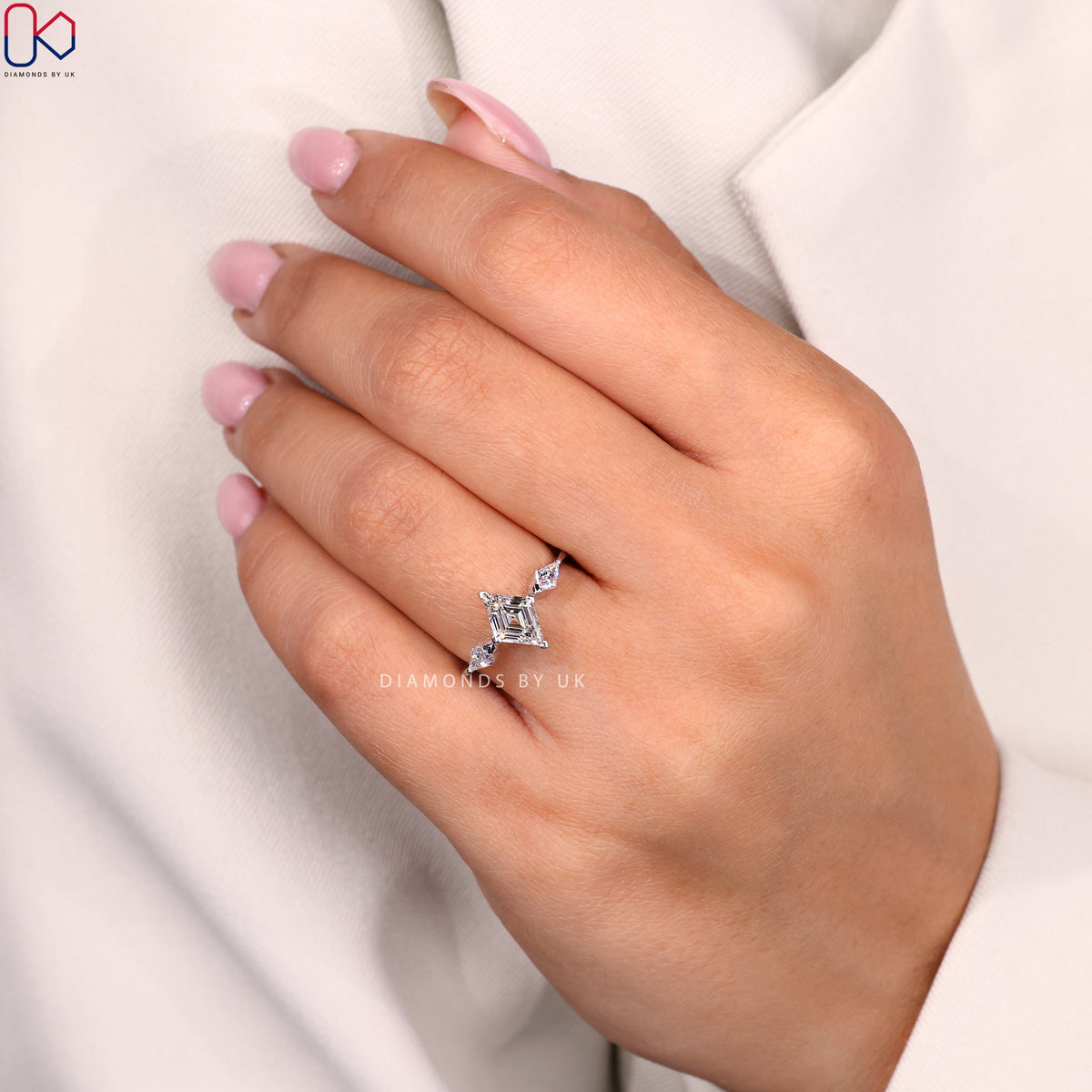 Lozenge Cut Diamond Ring With Kite Side Stones