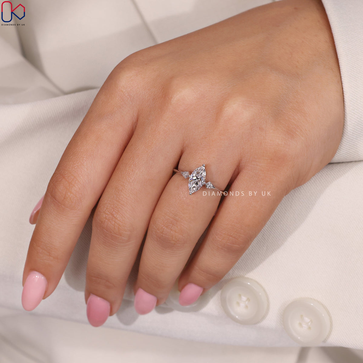 Marquise and Round Diamond engagement Ring In White Gold