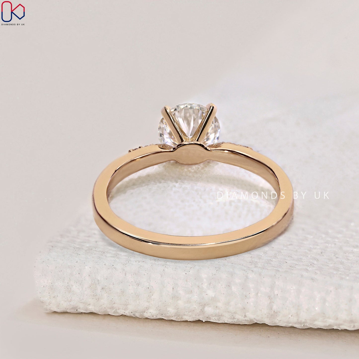 Round Cut Diamond Ring With Pinched Shank Band