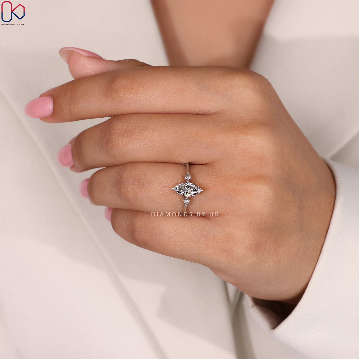 Marquise and Round Diamond engagement Ring In White Gold