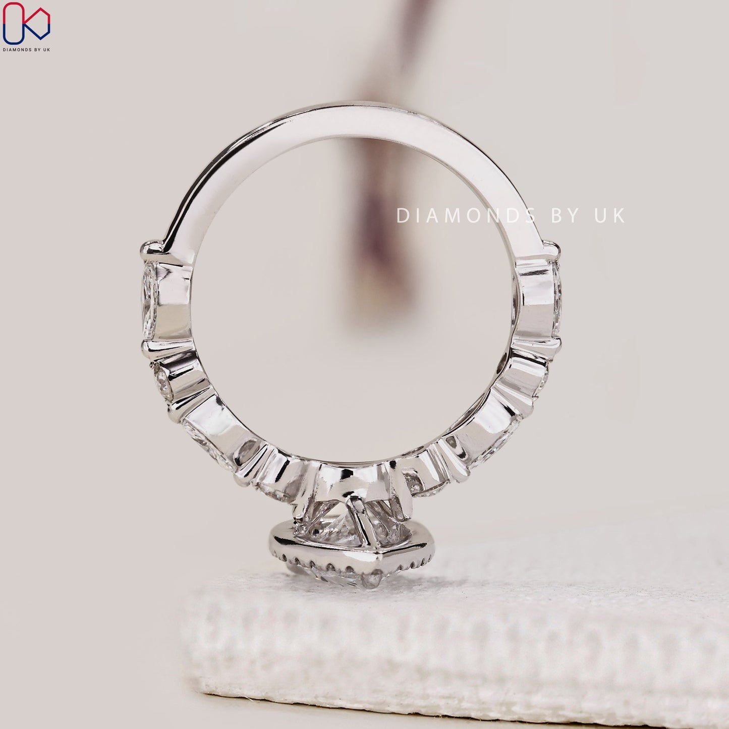 Pear Shape Engagement Ring With Floating Bubble Prong