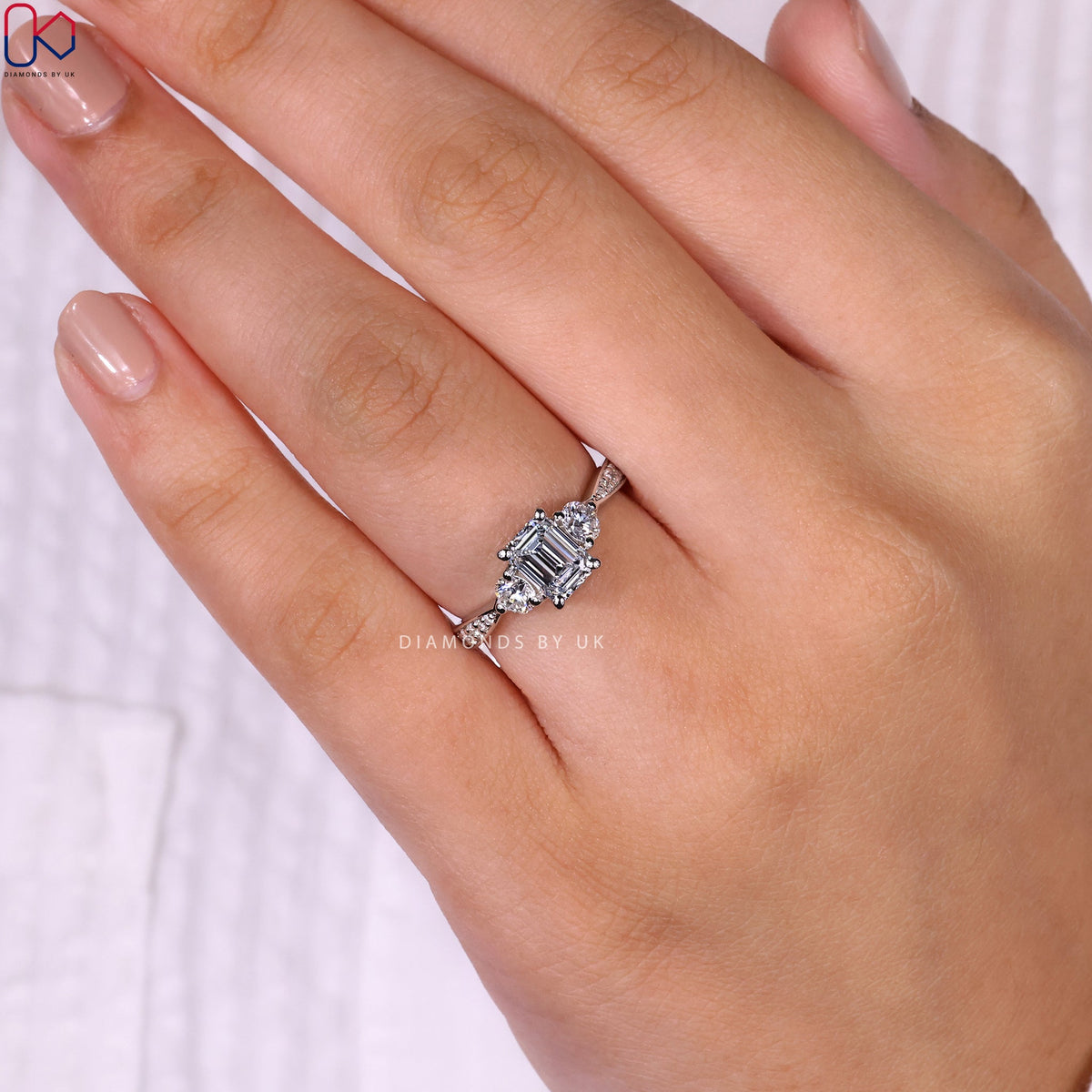 Emerald Cut Diamond Ring With Tapered Pave Band