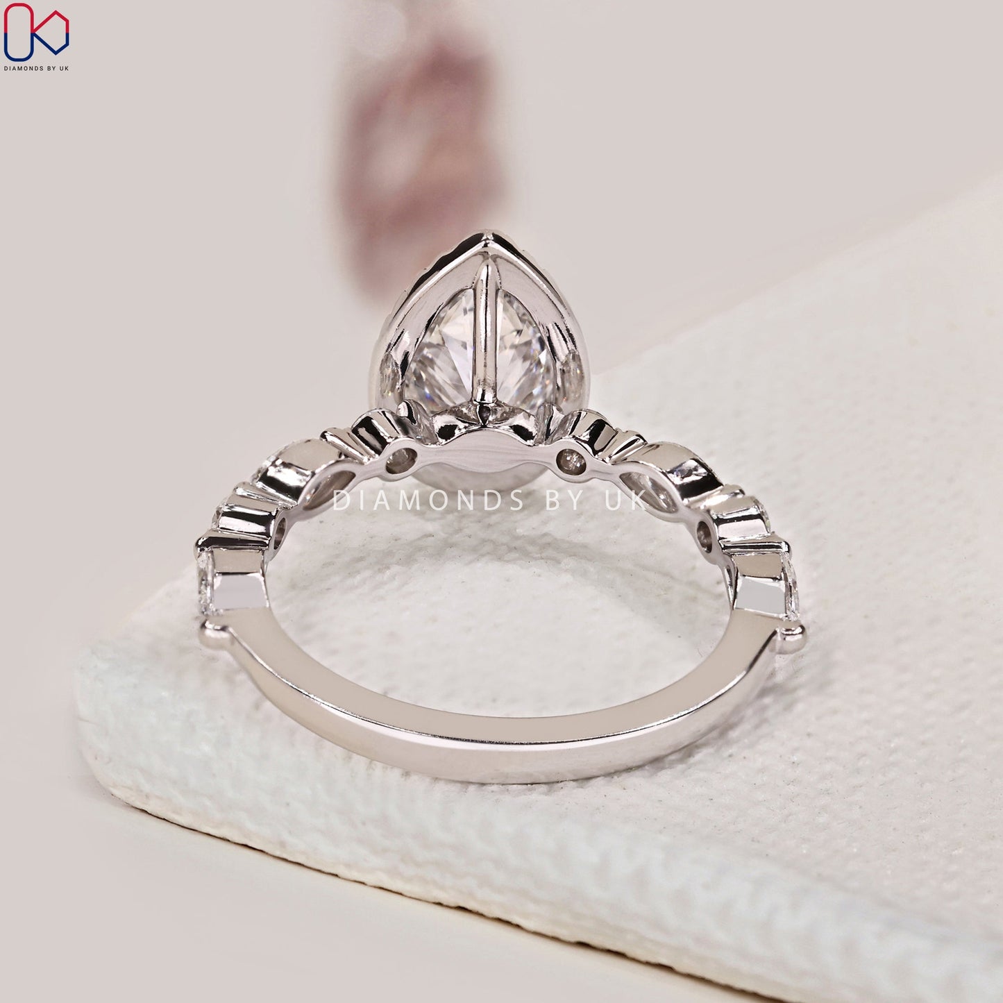 Pear Shape Engagement Ring With Floating Bubble Prong