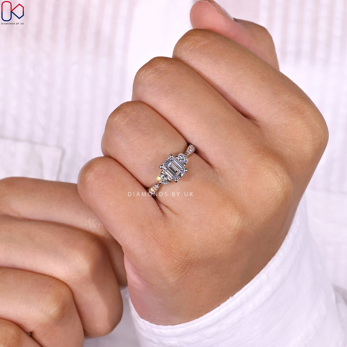 Emerald Cut Diamond Ring With Tapered Pave Band