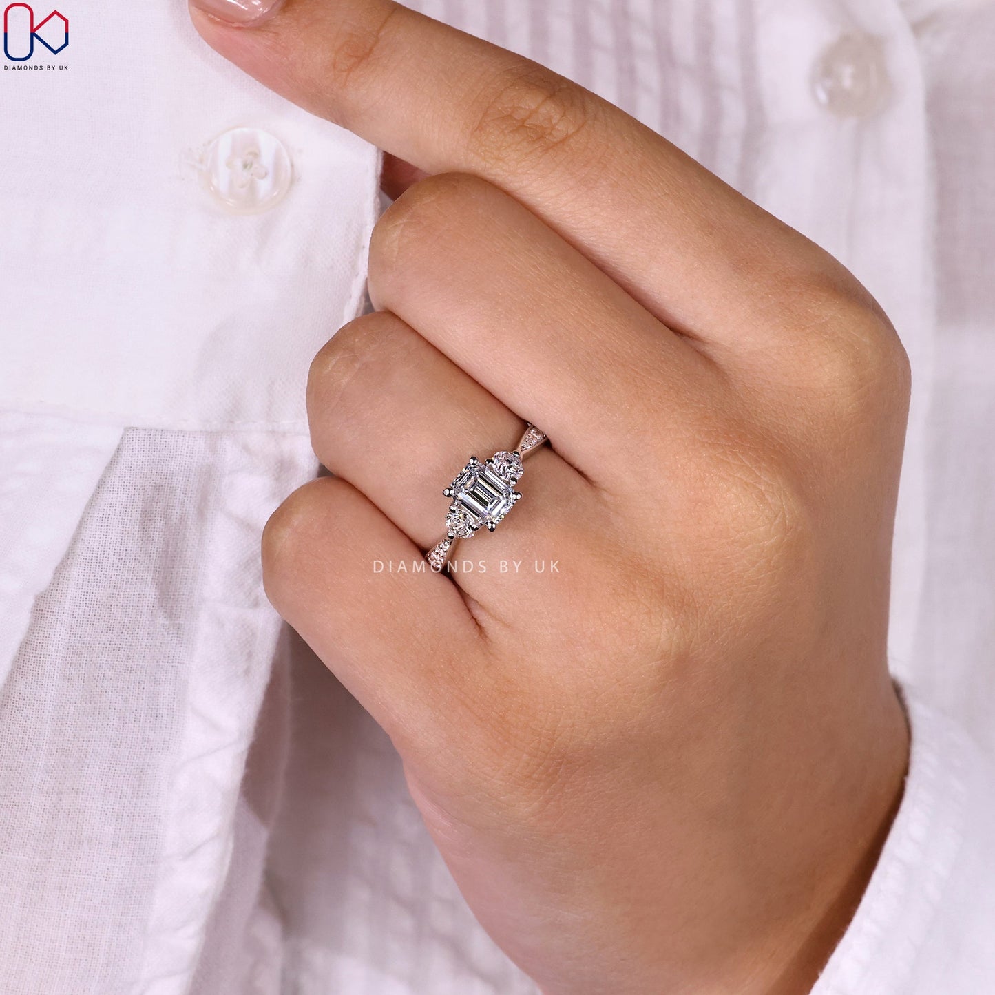 Emerald Cut Diamond Ring With Tapered Pave Band