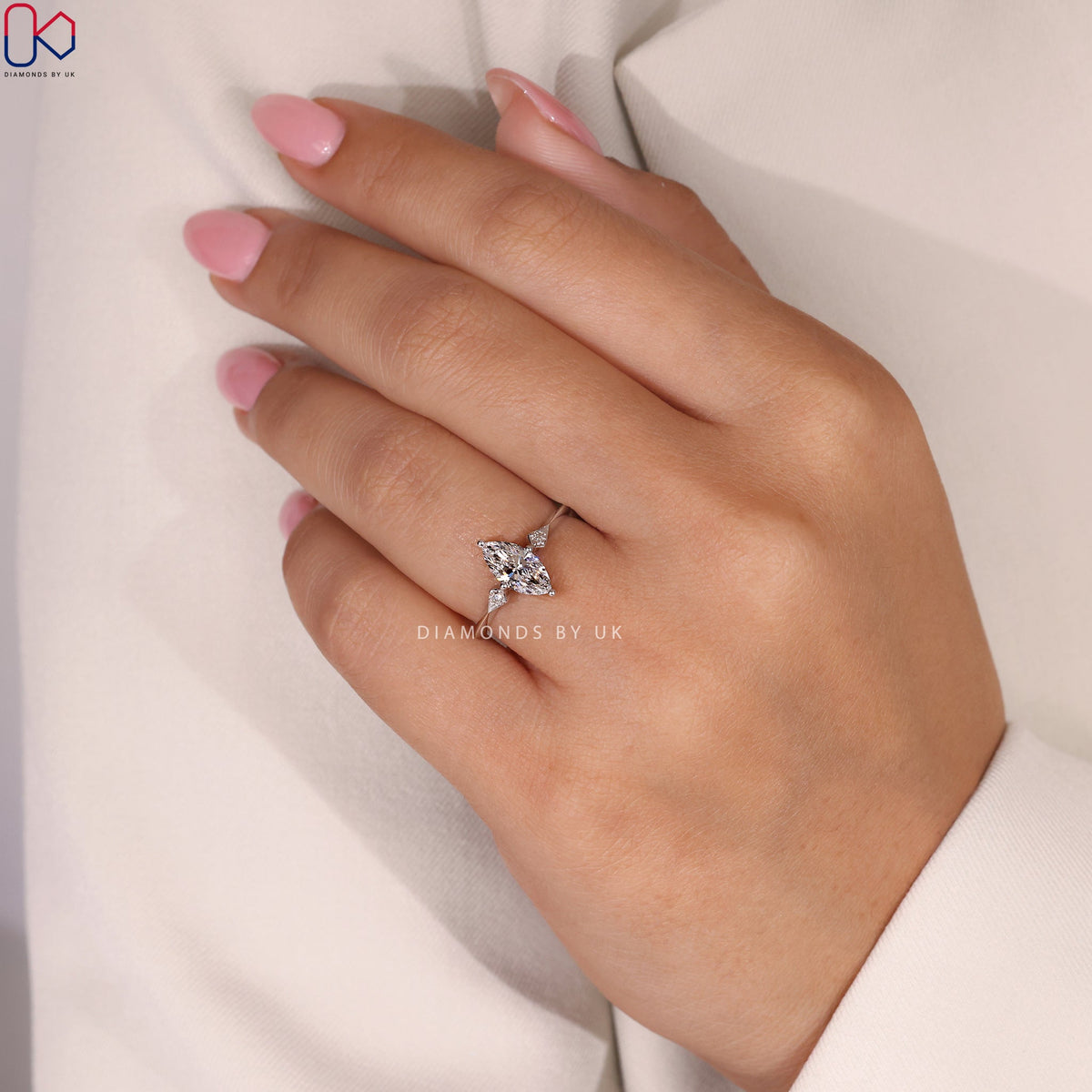Marquise and Round Diamond engagement Ring In White Gold