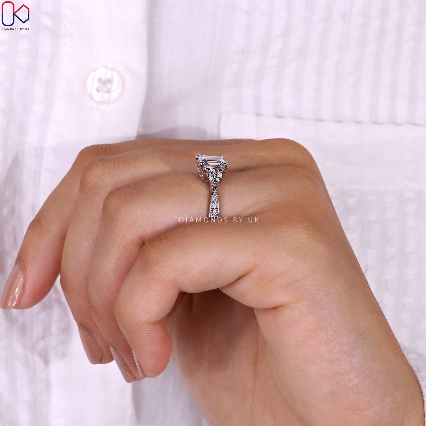 Emerald Cut Diamond Ring With Tapered Pave Band