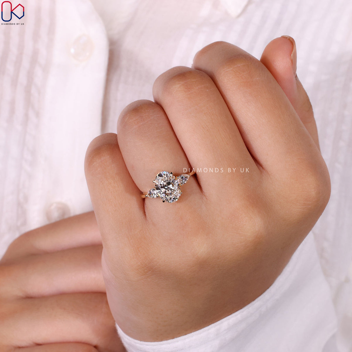 3 Stone Engagement Ring - Oval and Pear Diamond