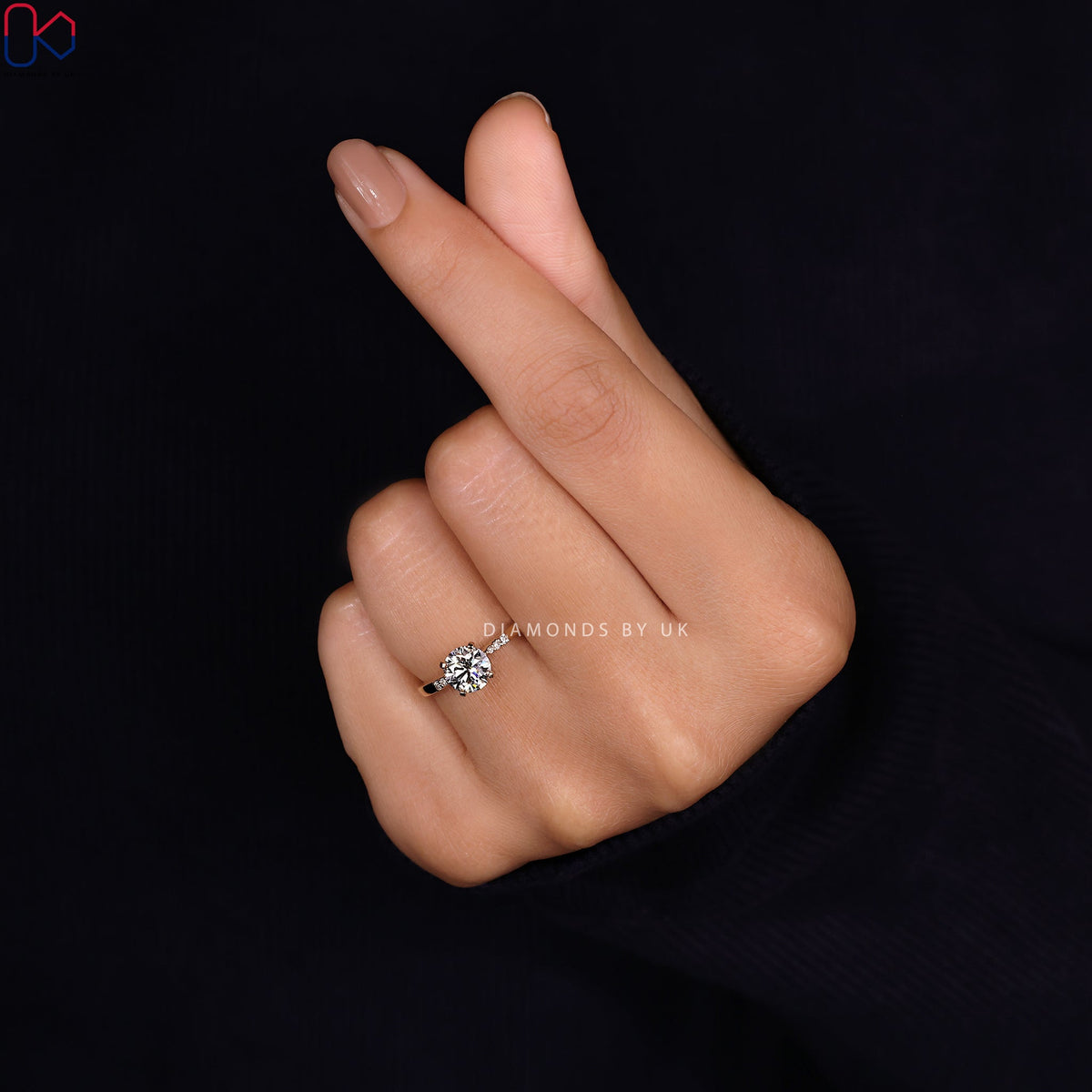 Round Cut Diamond Ring With Pinched Shank Band
