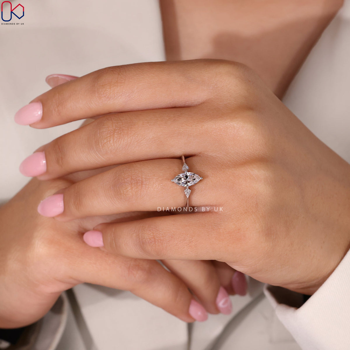 Marquise and Round Diamond engagement Ring In White Gold