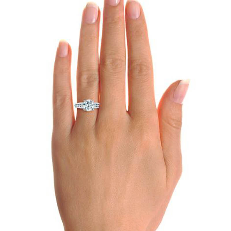 Round Cut Moissanite Graduated Channel Set Rope Twist Engagement Ring