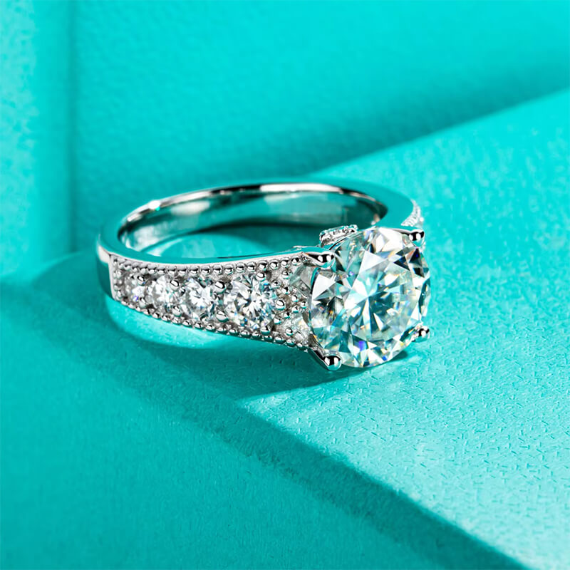 Round Moissanite Graduated Side Stone Milgrain Engagement Ring