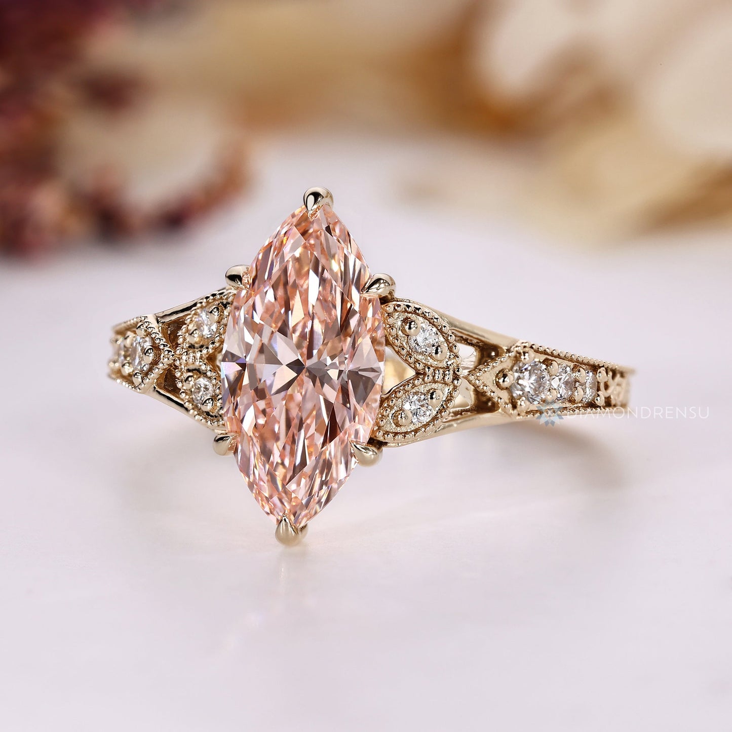 Pink Marquise Art Deco Ring with Round Side Stones and Milgrain Details