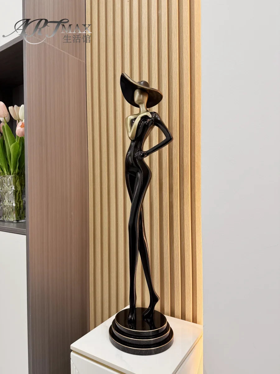 Elongated Figure Sculpture