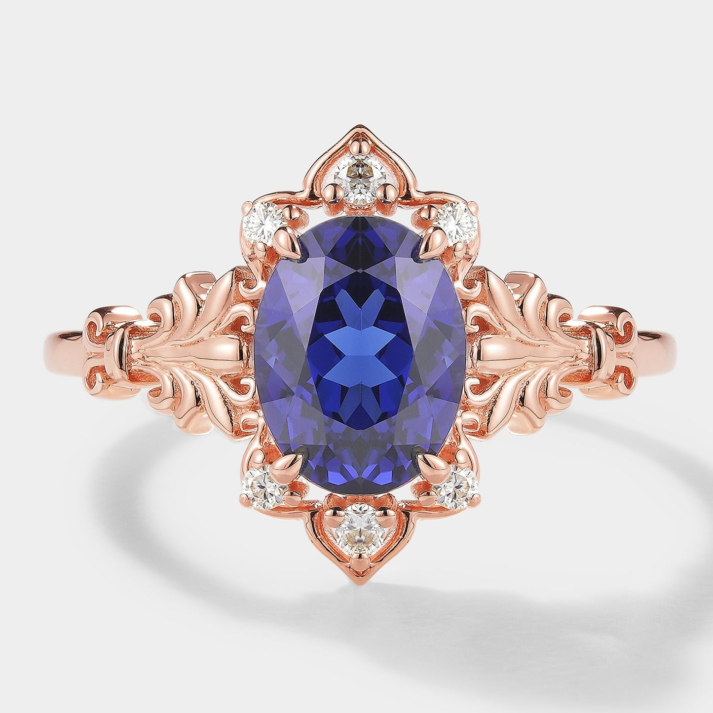 Oval Cut Royal Blue Sapphire Engagement Ring With Iris