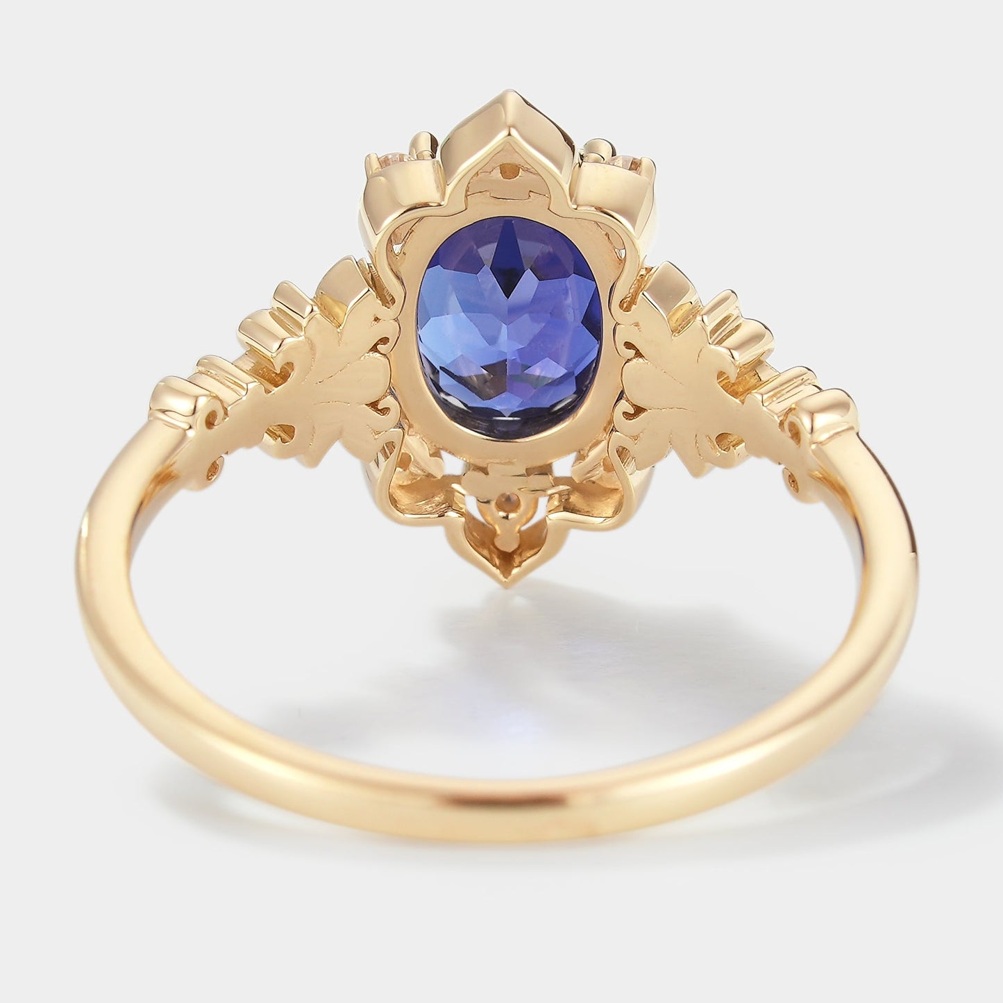 Oval Cut Royal Blue Sapphire Engagement Ring With Iris