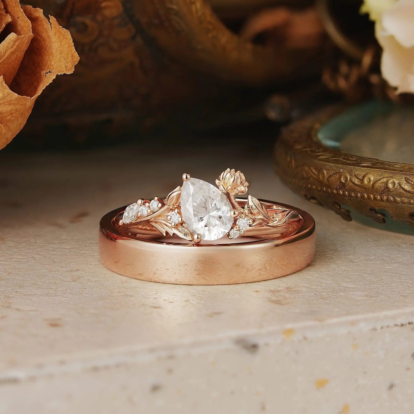 Snow Lotus Flower Inspired Pear Cut Moissanite Tilted Couple Wedding Ring Set - Kara & Evren | GemsMagic