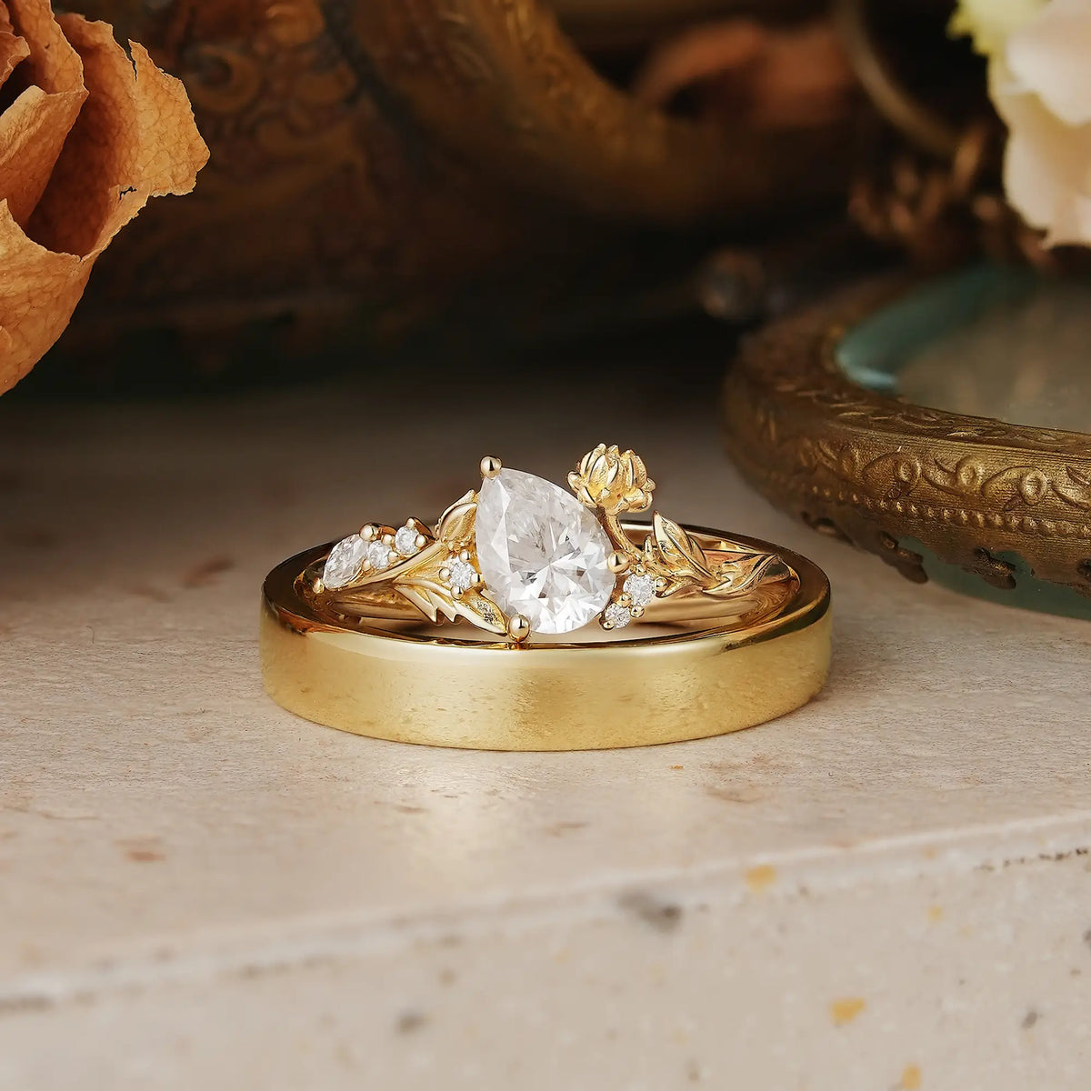 Snow Lotus Flower Inspired Pear Cut Moissanite Tilted Couple Wedding Ring Set - Kara & Evren | GemsMagic