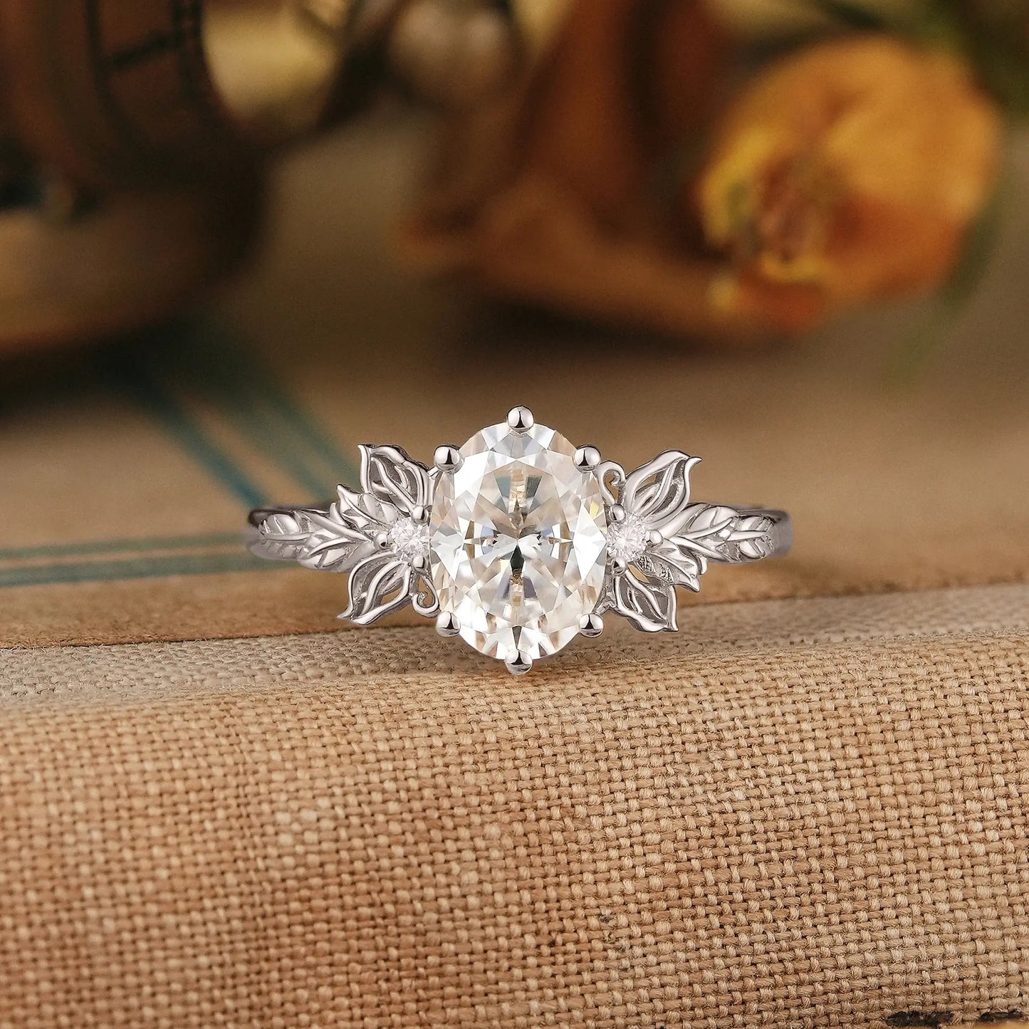Butterfly Inspired Oval Moissanite Engagement Ring with Carved Hollow Leaf Design - Mariselle | GemsMagic