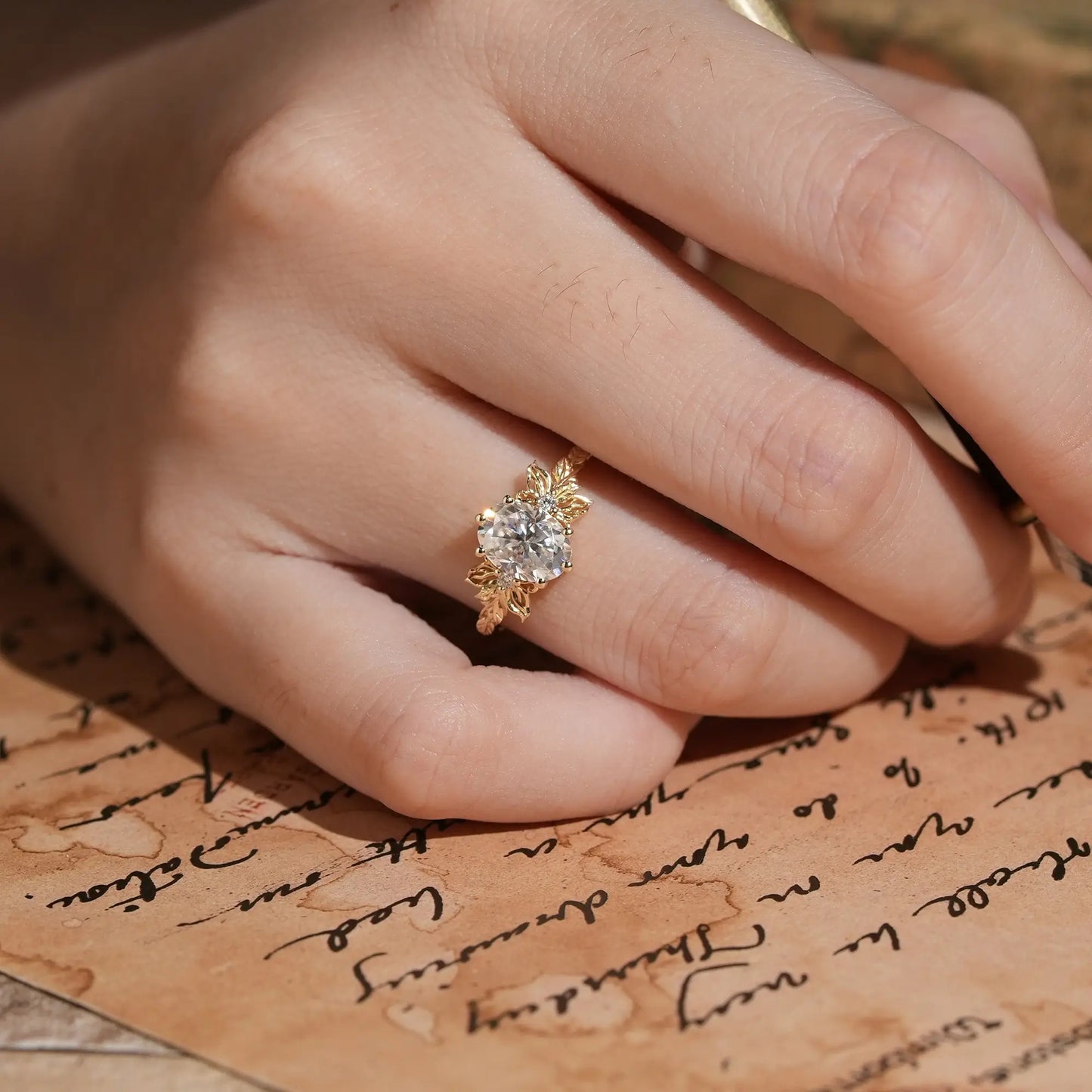 Butterfly Inspired Oval Moissanite Engagement Ring with Carved Hollow Leaf Design - Mariselle | GemsMagic