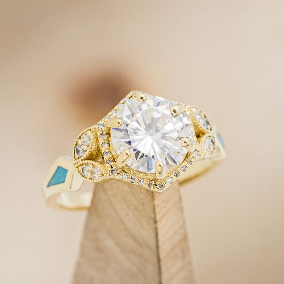 "Lucy In The Sky" - Round Cut Moissanite Engagement Ring With Diamonds, Turquoise Inlays & A Diamond Tracer