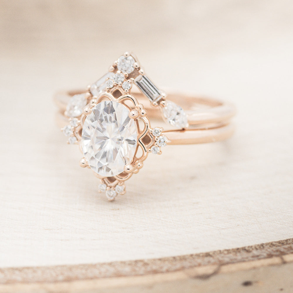 "Treva" - Oval Moissanite Engagement Ring With Diamond Accents & "Melody" Tracer