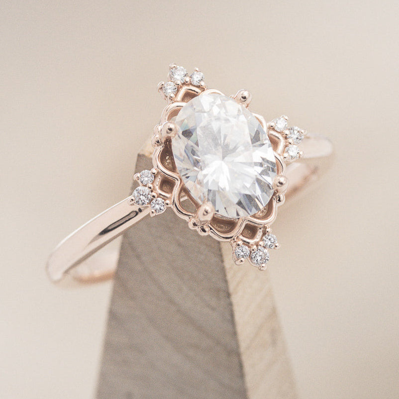 "Treva" - Oval Moissanite Engagement Ring With Diamond Accents & "Melody" Tracer