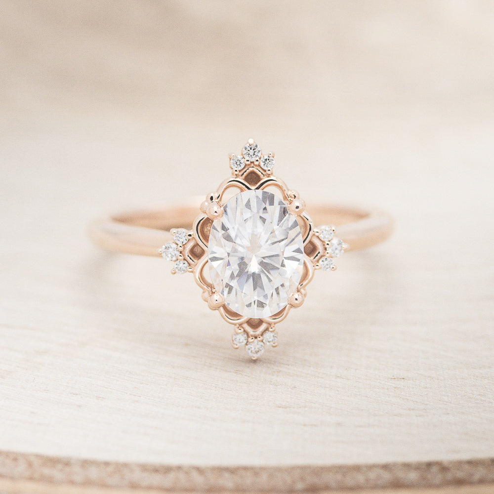 "Treva" - Oval Moissanite Engagement Ring With Diamond Accents & "Melody" Tracer