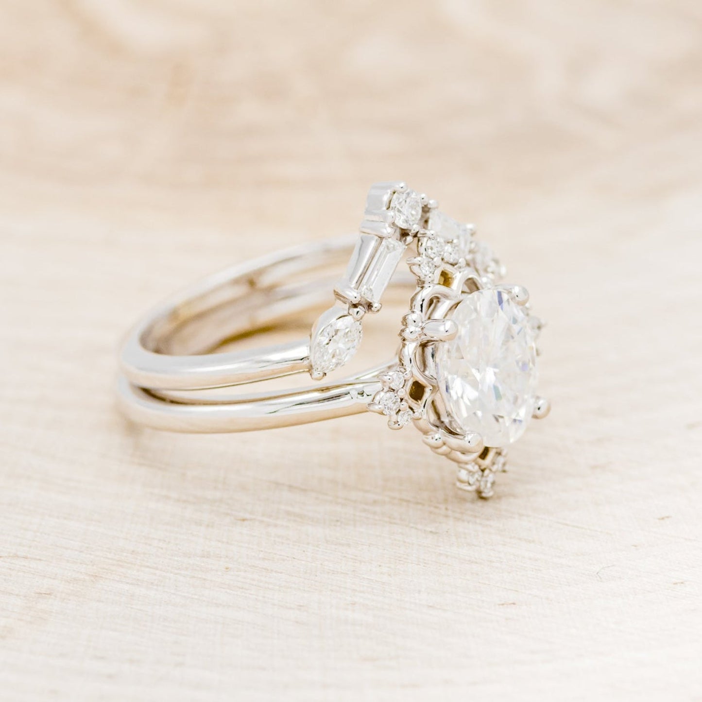 "Treva" - Oval Moissanite Engagement Ring With Diamond Accents & "Melody" Tracer