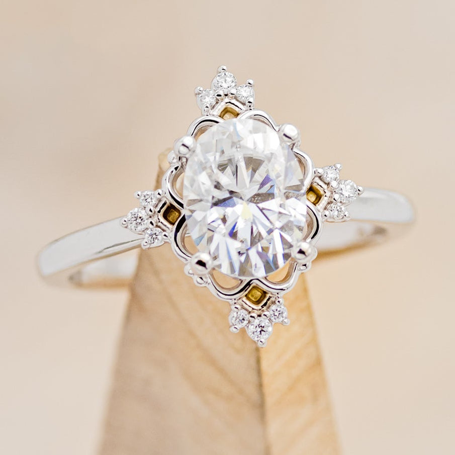"Treva" - Oval Moissanite Engagement Ring With Diamond Accents & "Melody" Tracer