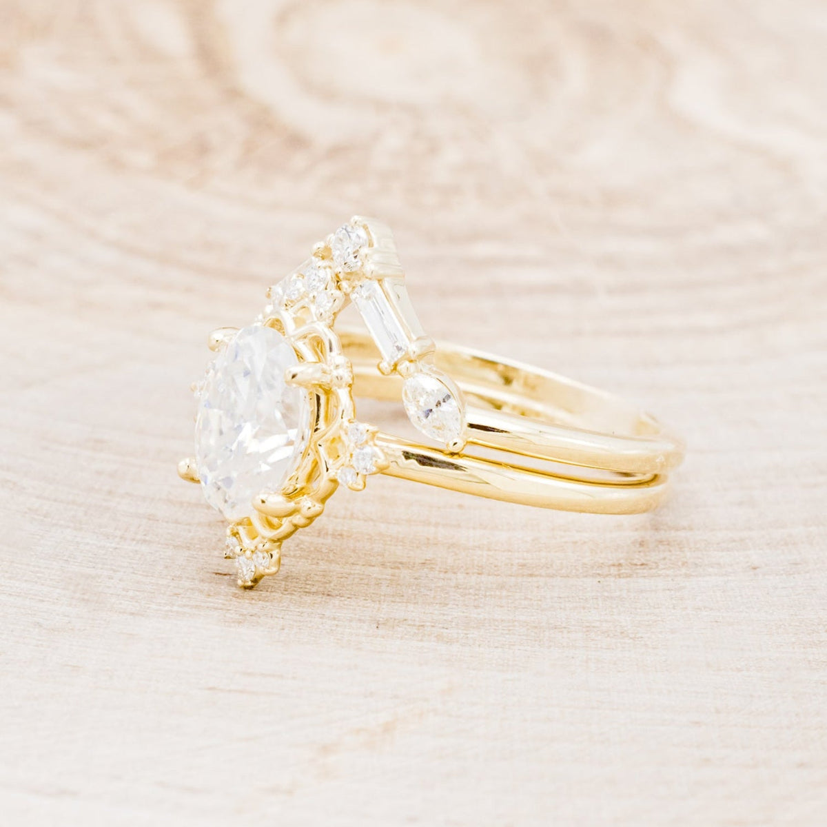 "Treva" - Oval Moissanite Engagement Ring With Diamond Accents & "Melody" Tracer