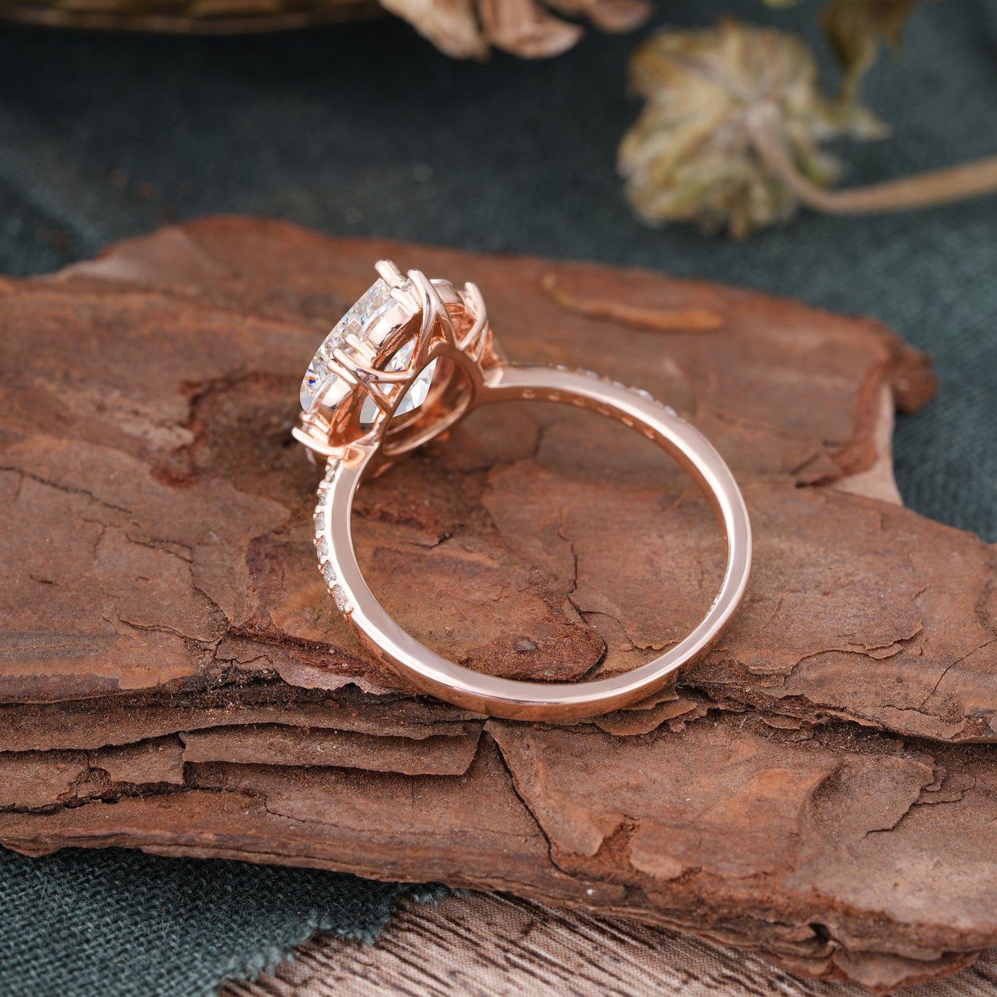 Custom-made, with a 1.5-carat center stone.