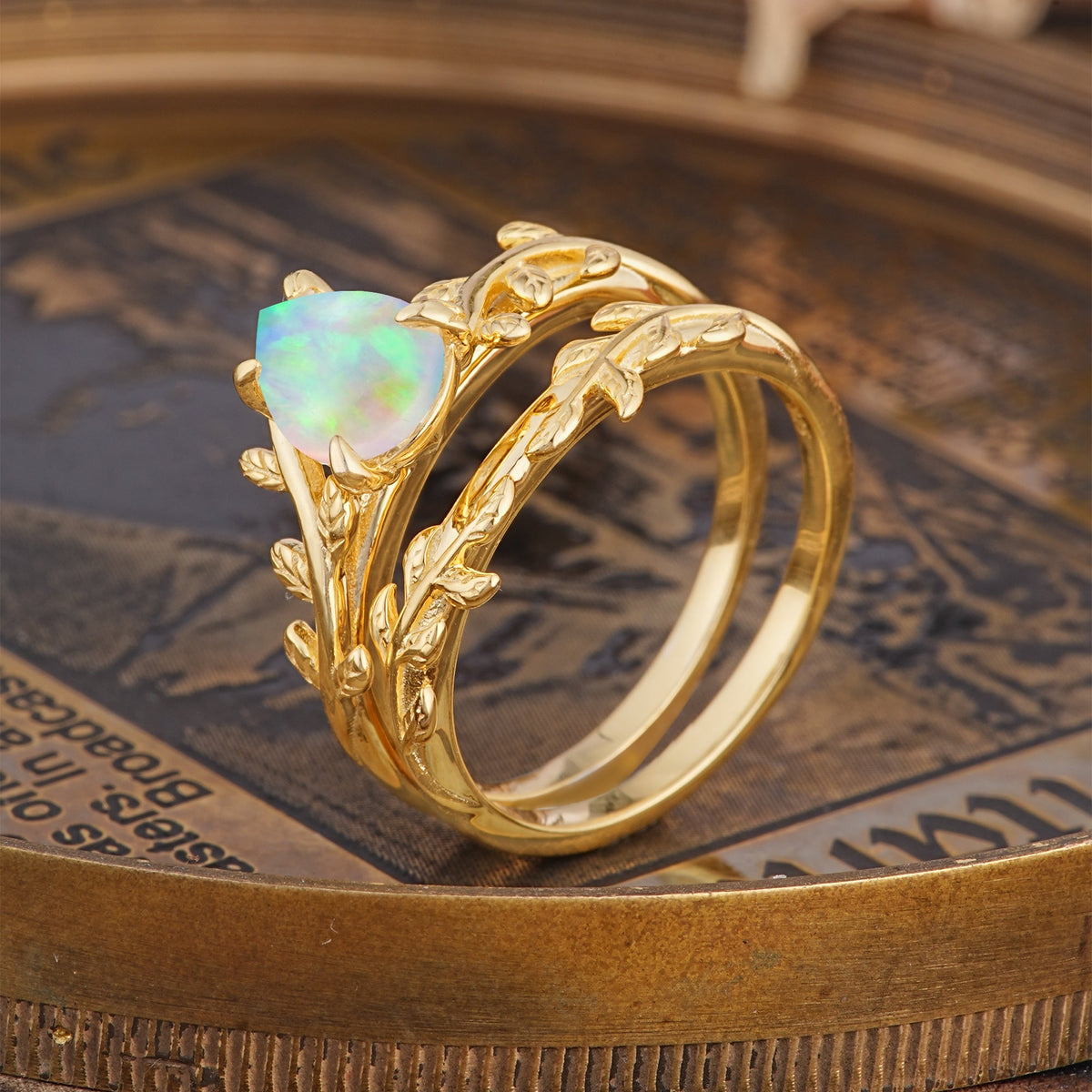 Artistic Vine  Themed 4 - Prong Pear Cut Opal Bridal Ring Set