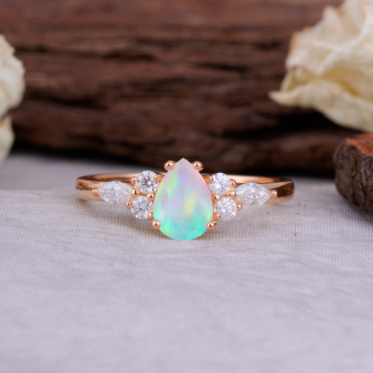 Sophisticated 4-Prong Pear-Cut Fire Opal Engagement Ring