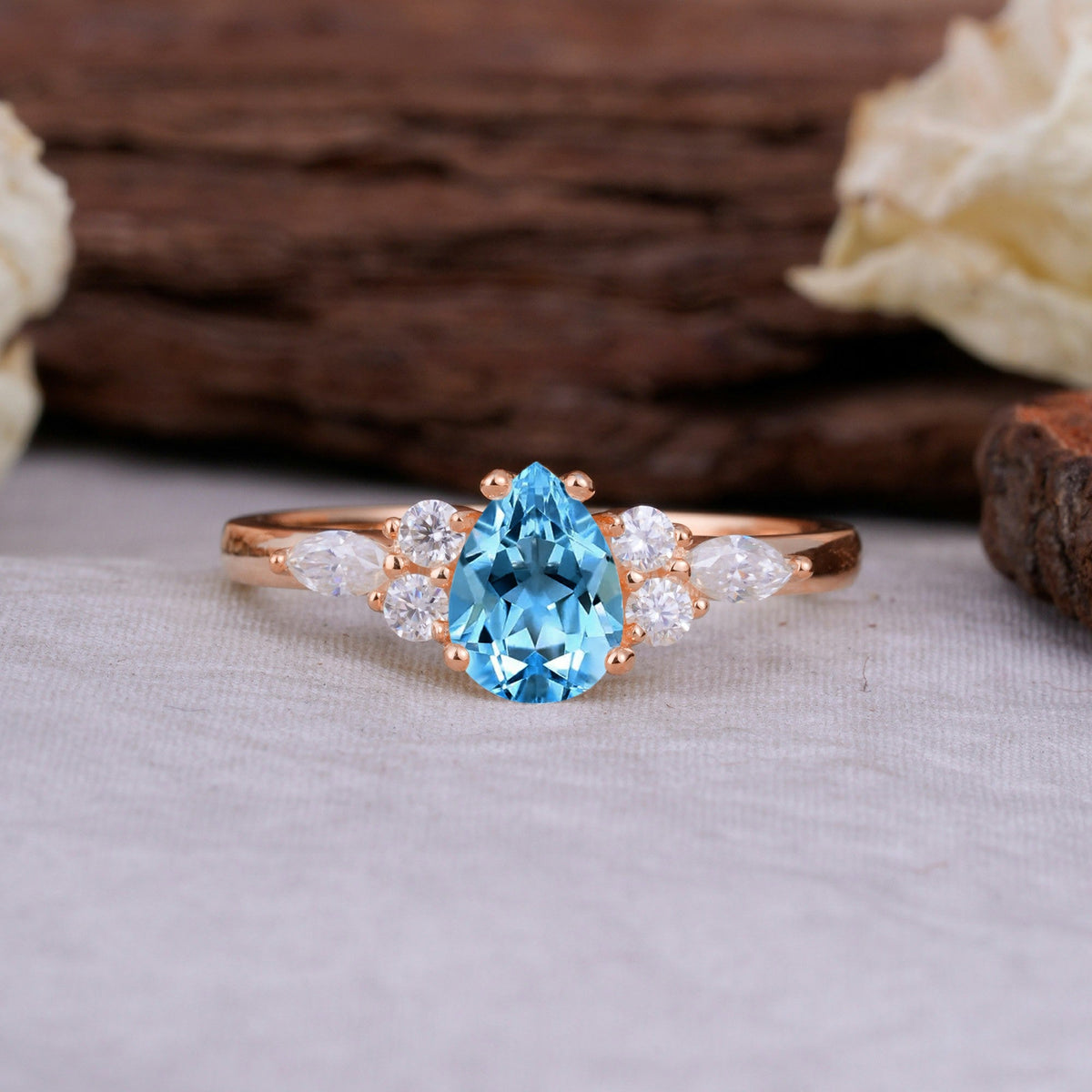 Sophisticated 4-Prong Pear-Cut Aquamarine Engagement Ring