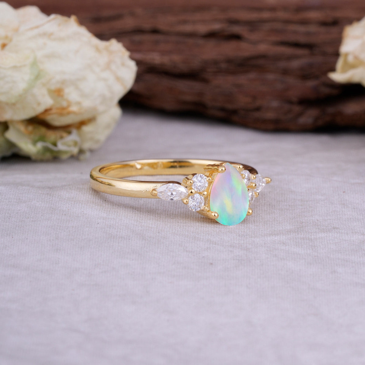 Sophisticated 4-Prong Pear-Cut Fire Opal Engagement Ring