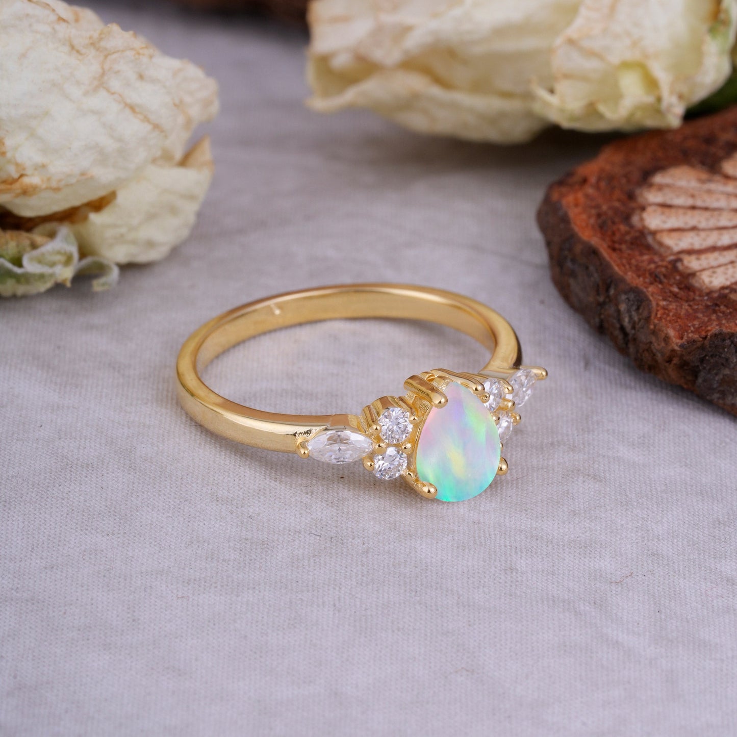 Sophisticated 4-Prong Pear-Cut Fire Opal Engagement Ring