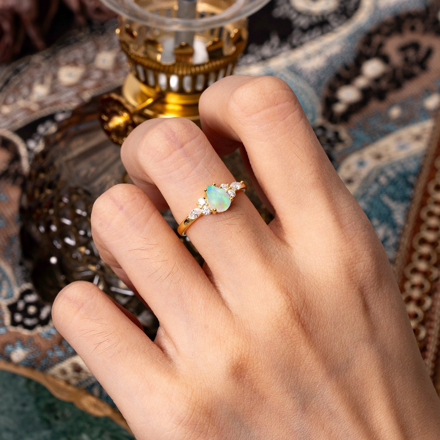 Sophisticated 4-Prong Pear-Cut Fire Opal Engagement Ring