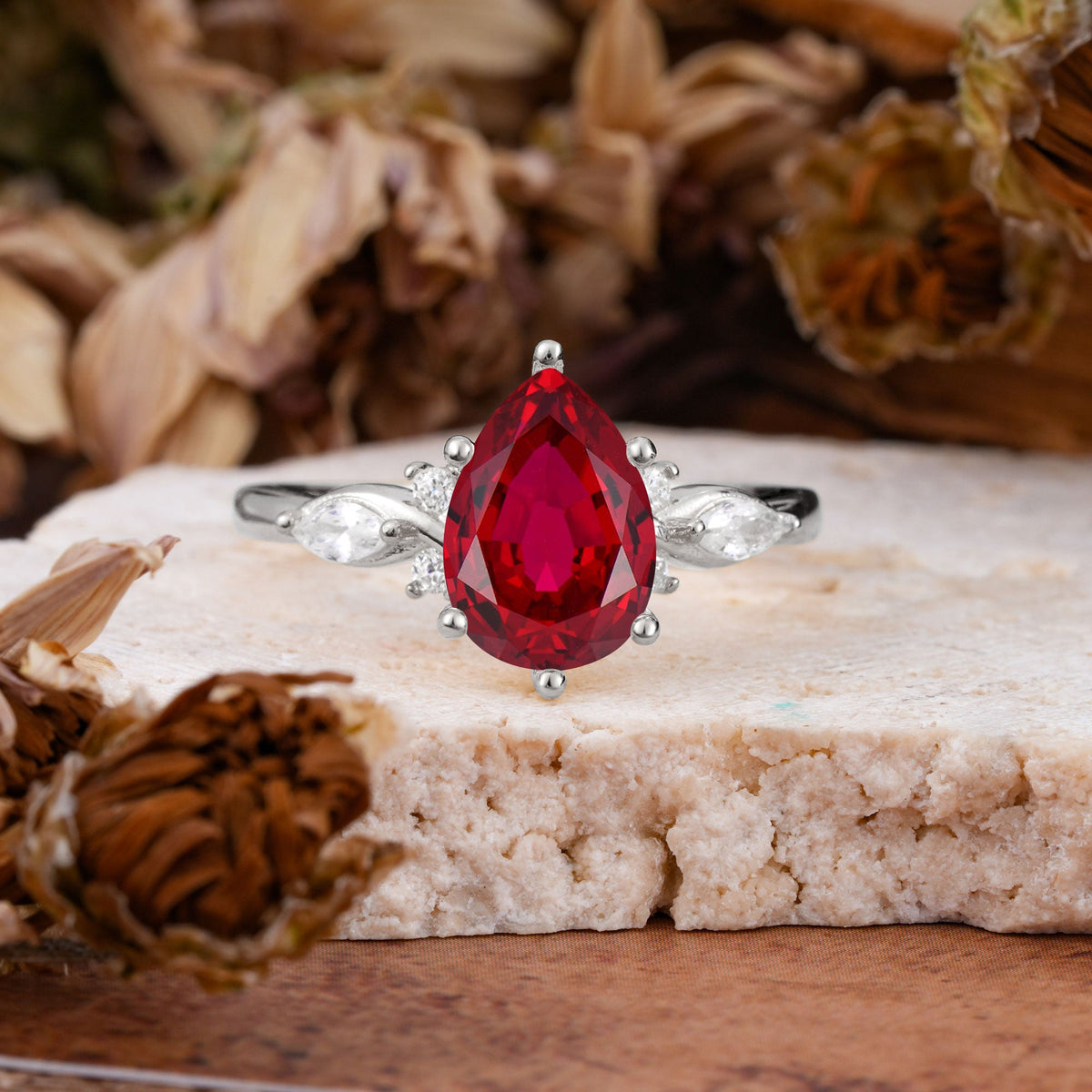 Vintage Pear Cut Ruby Three Side Stone Engagement Ring with Accents