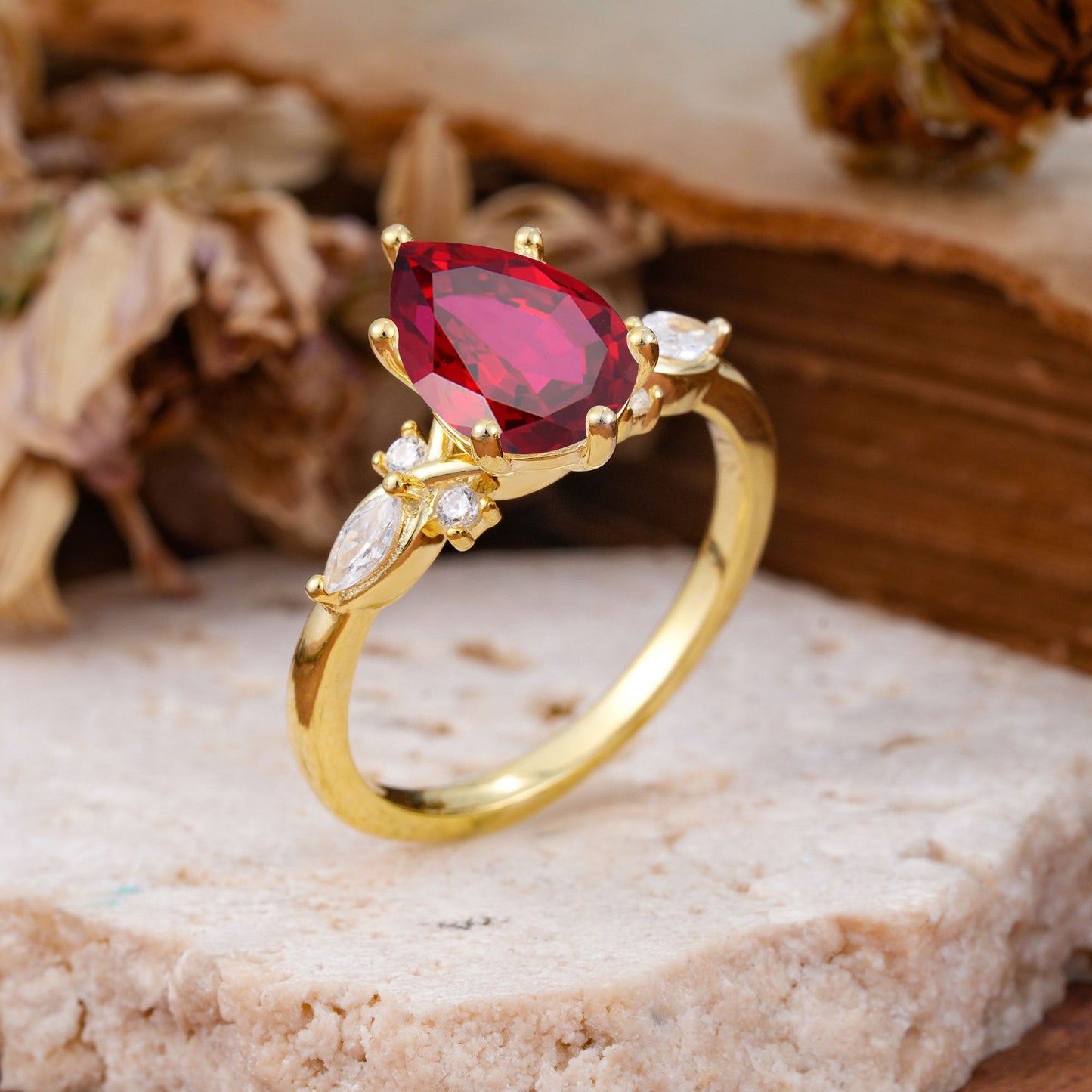 Vintage Pear Cut Ruby Three Side Stone Engagement Ring with Accents