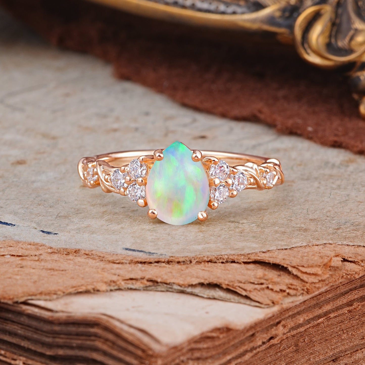 Nature-Inspired Vintage 4-Prong Pear Cut Opal Engagement Ring