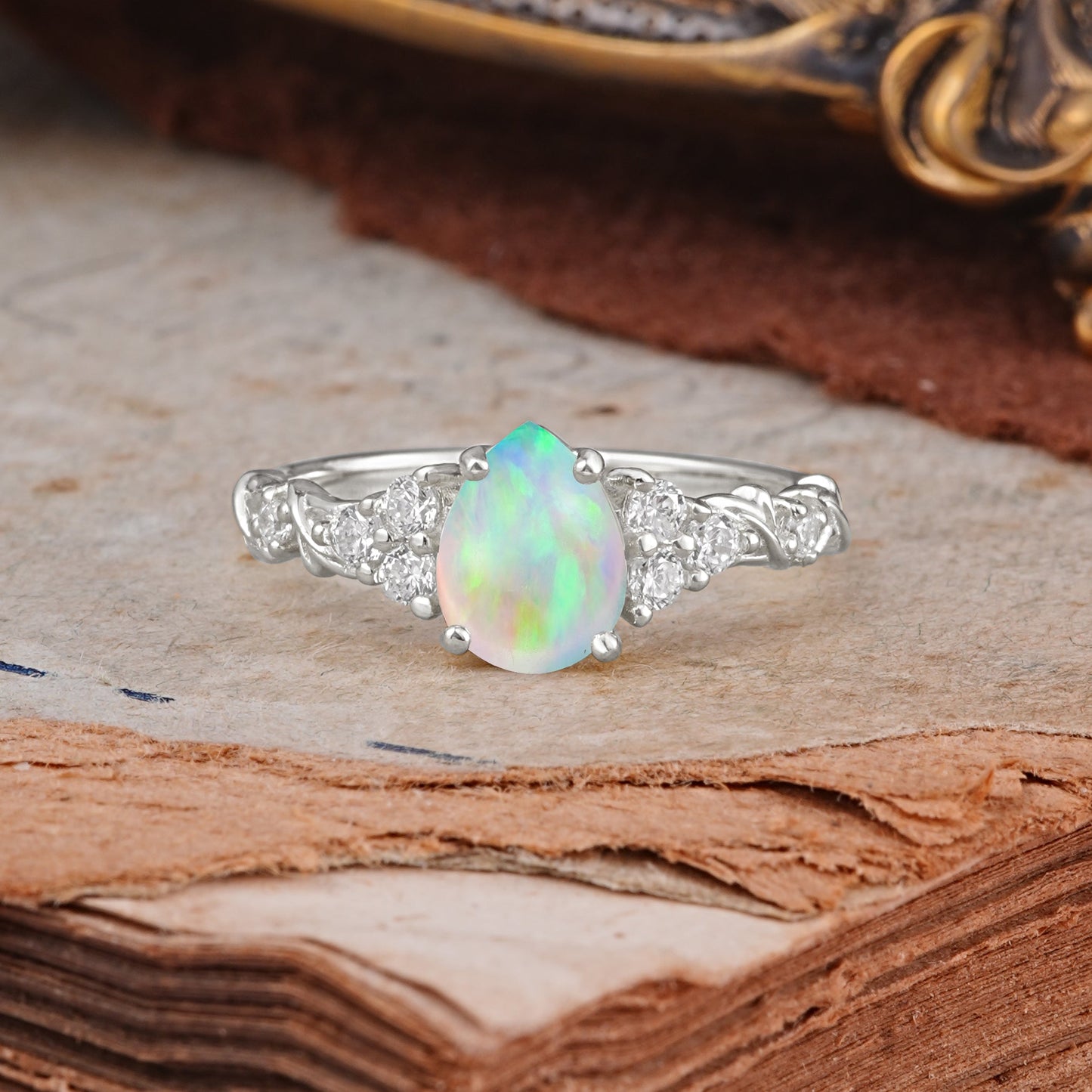 Nature-Inspired Vintage 4-Prong Pear Cut Opal Engagement Ring
