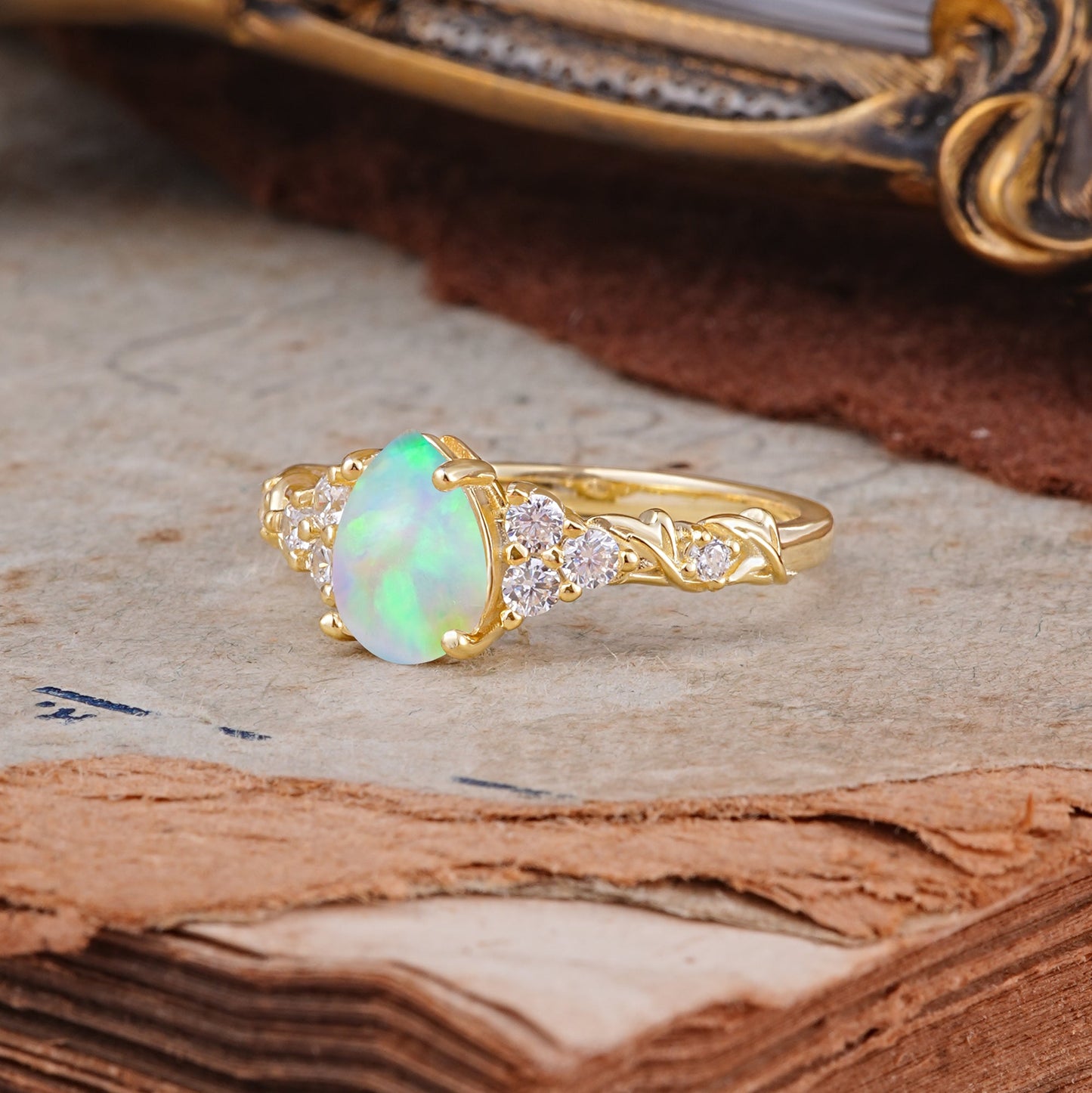 Nature-Inspired Vintage 4-Prong Pear Cut Opal Engagement Ring