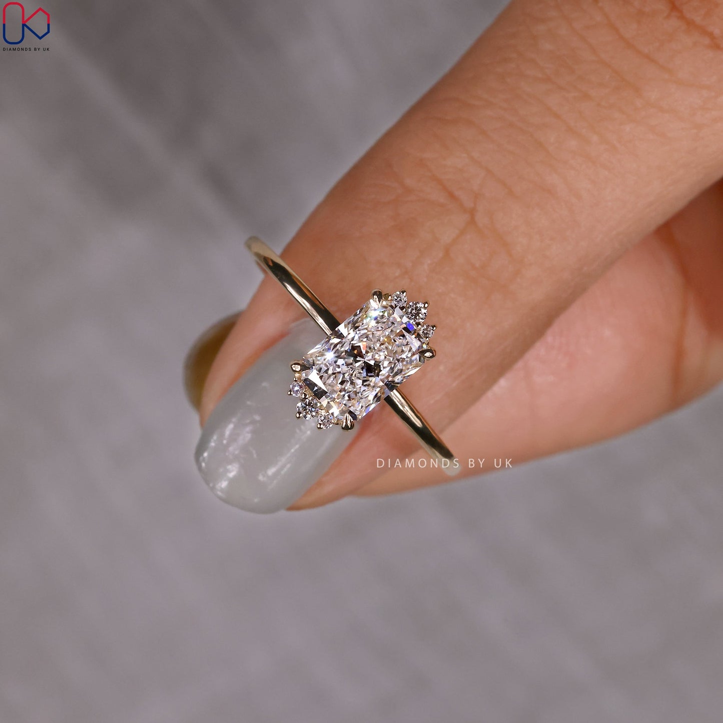 Elongated Radiant Cut Diamond Ring In Yellow Gold