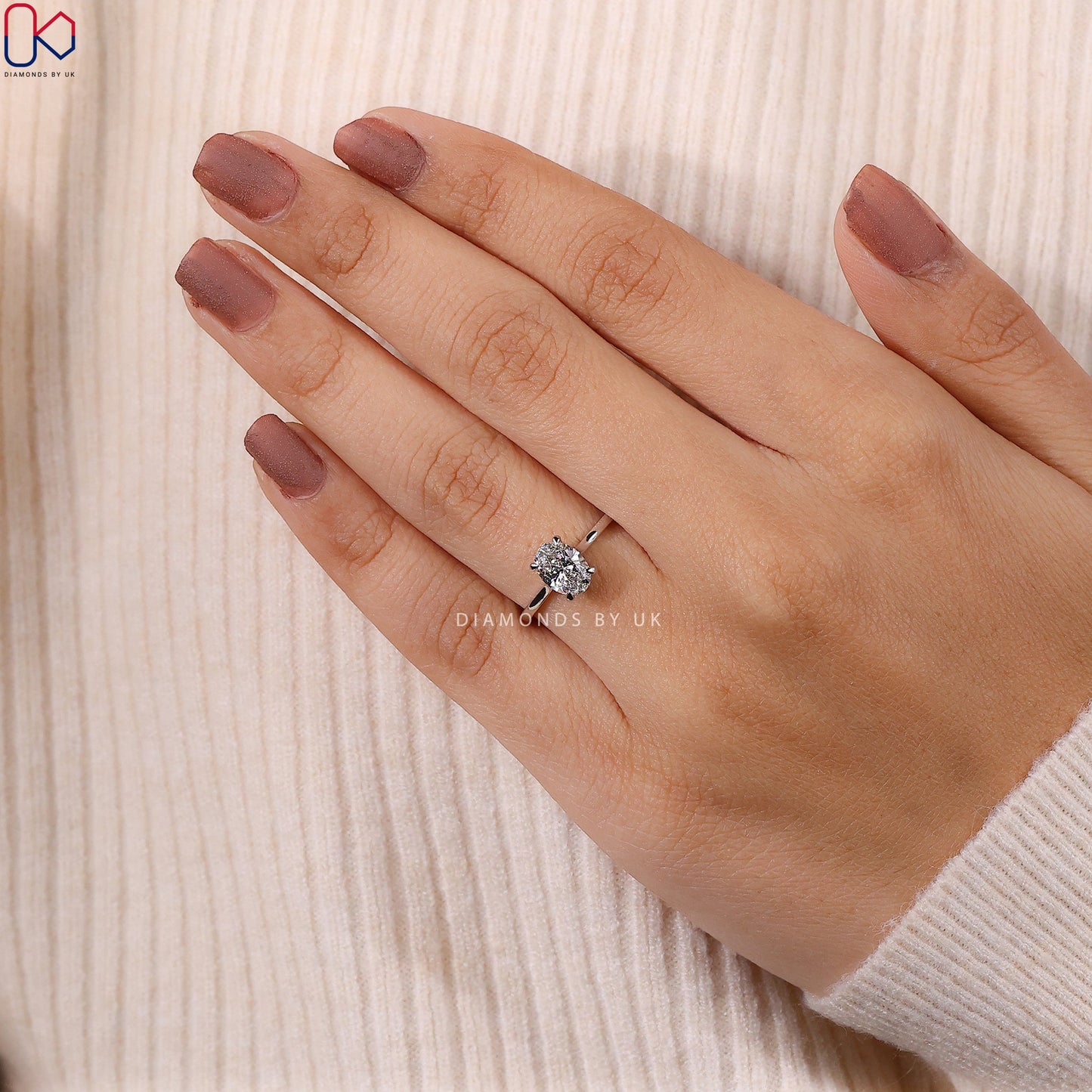 Oval Solitaire Engagement Ring With Cathedral Setting