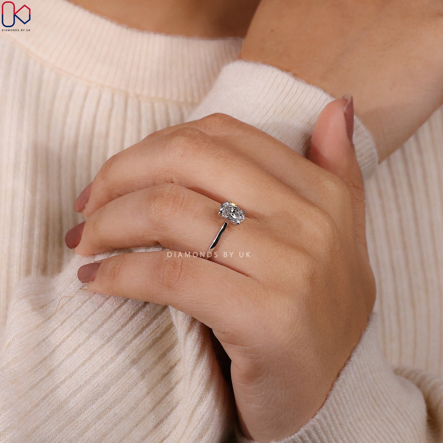 Oval Solitaire Engagement Ring With Cathedral Setting