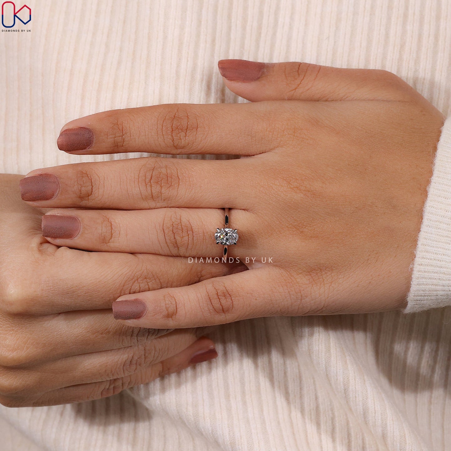 Oval Solitaire Engagement Ring With Cathedral Setting