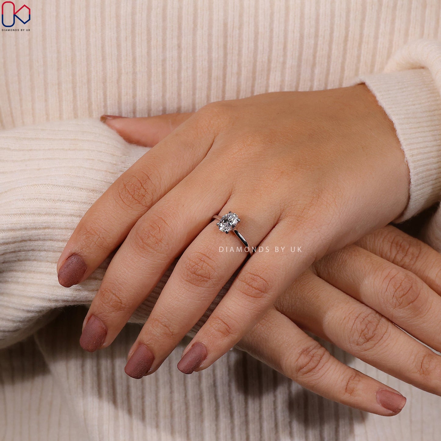 Oval Solitaire Engagement Ring With Cathedral Setting