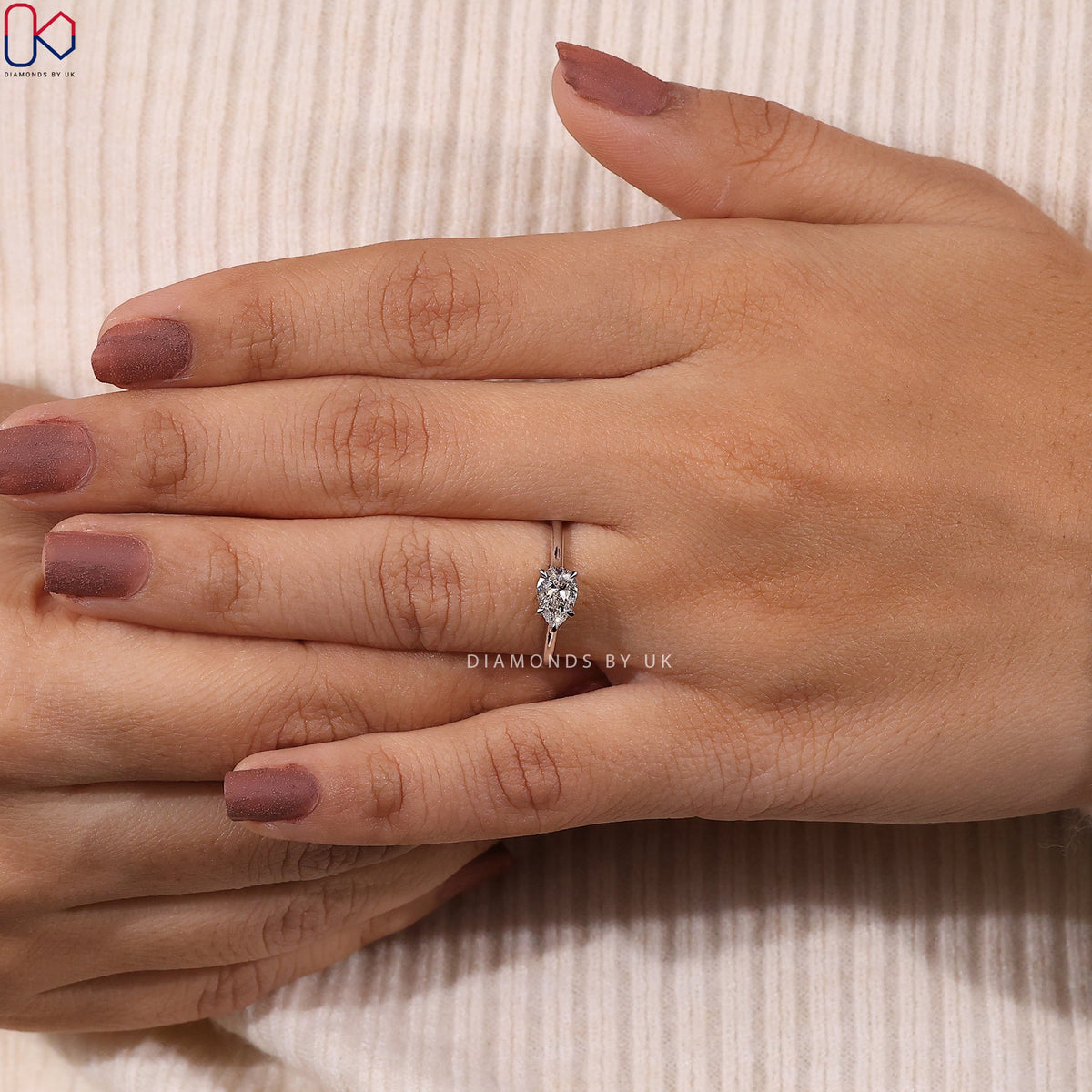 Pear diamond East West Diamond Ring
